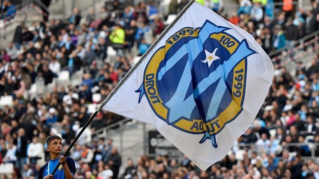 Olympique Marseille's flag with the logo is waved prior to the French L1 football match between Olympique de Marseille (OM) and Football Club de Nantes (FCN) at the Velodrome Stadium in Marseille, southern France, on February 22, 2020. - Nantes won 3-1.