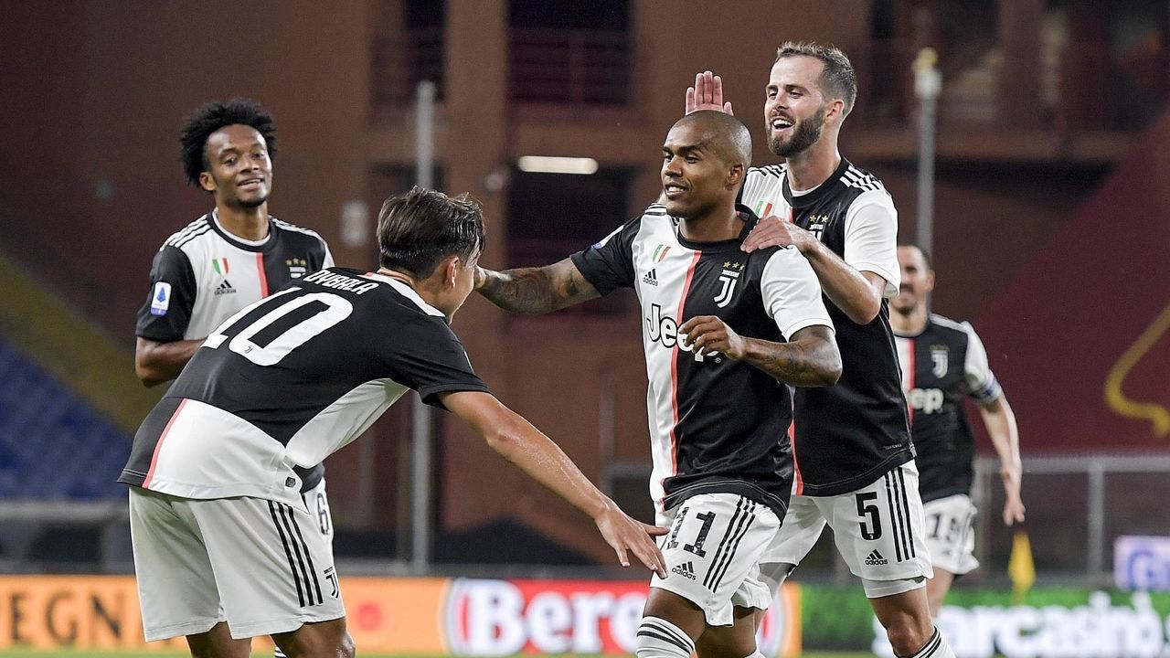 GENOA, ITALY - JUNE 30: Juventus player Douglas Costa celebrates 0-3 goal during the Serie A match between Genoa CFC and Juventus at Stadio Luigi Ferraris on June 30, 2020 in Genoa, Italy.