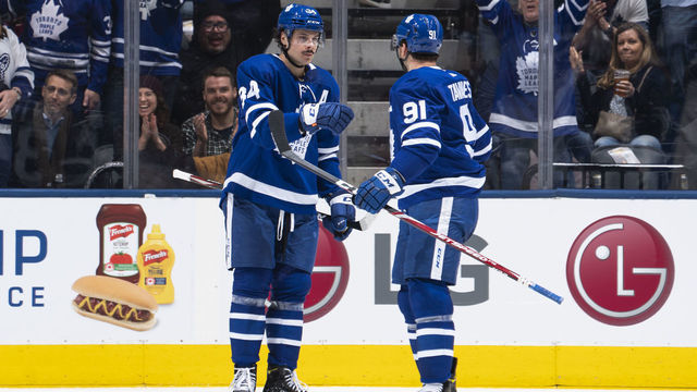 TORONTO, ON - FEBRUARY 7: John Tavares #91 of the Toronto Maple Leafs celebrates his goal against the Anaheim Ducks with teammate Auston Matthews #34 during the second period at the Scotiabank Arena on February 7, 2020 in Toronto, Ontario, Canada.