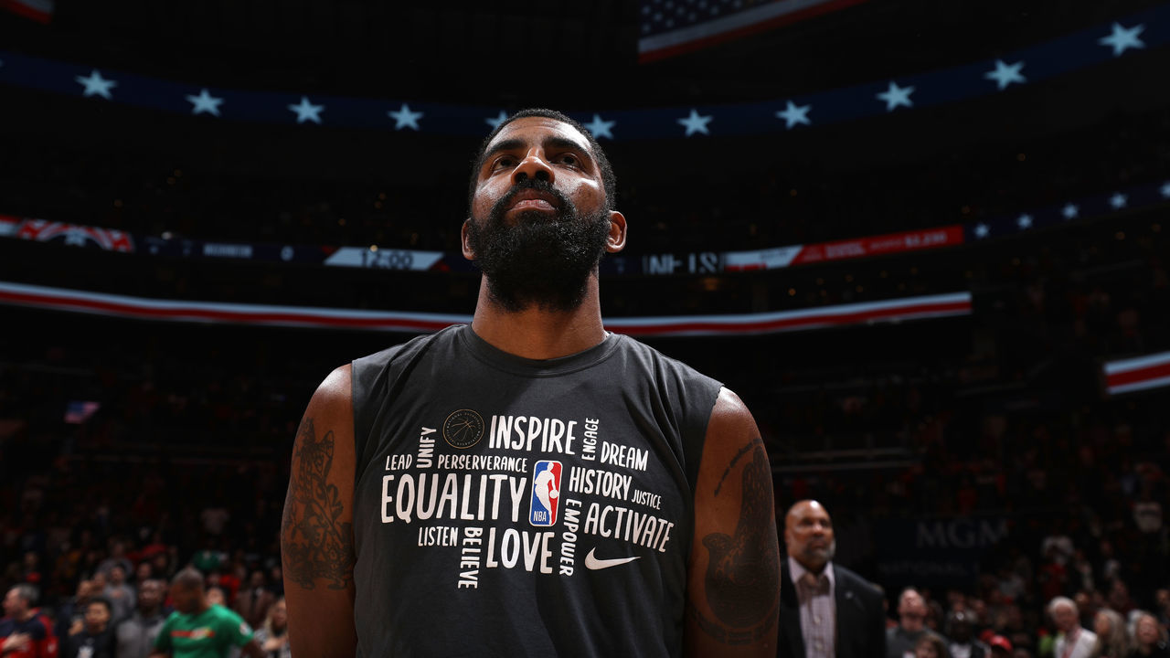 WASHINGTON, DC - FEBRUARY 1: Kyrie Irving #11 of the Brooklyn Nets stands for the national anthem before the game against the Washington Wizards on February 1, 2020 at Capital One Arena in Washington, DC. Mandatory Copyright Notice: Copyright 2020 NBAE