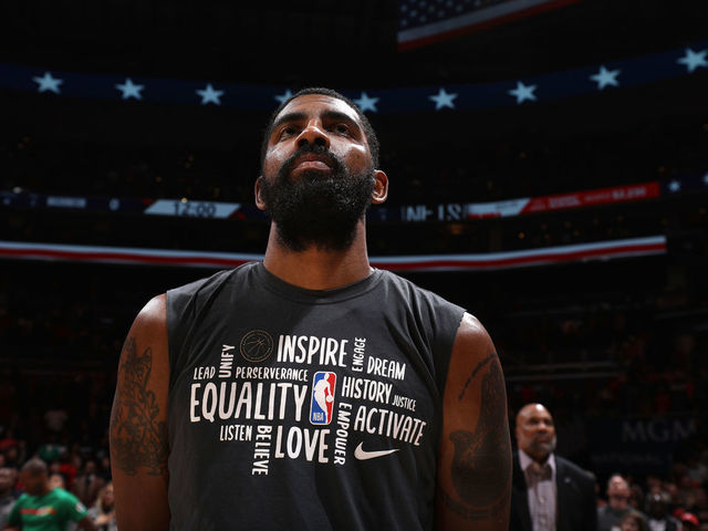 WASHINGTON, DC - FEBRUARY 1: Kyrie Irving #11 of the Brooklyn Nets stands for the national anthem before the game against the Washington Wizards on February 1, 2020 at Capital One Arena in Washington, DC. Mandatory Copyright Notice: Copyright 2020 NBAE