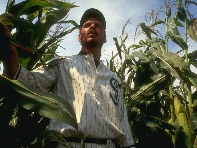 DYERSVILLE, IA - AUGUST 25: A "ghost player" in a vintage Chicago White Sox baseball uniform emerges from a cornfield as he re-enacts the scene at the baseball field created for the motion picture 'Field of Dreams' on August 25, 1991 in Dyersville, Iowa. Rita and Al Ameskamp who, with Don and Becky Lansing, co-own the site have turned the cornfields and baseball diamond into a summertime tourist attraction, including "ghost player" reenactments.