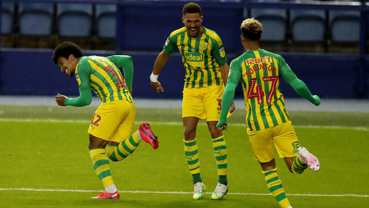 SHEFFIELD, ENGLAND - JULY 01: Matheus Pereira of West Bromwich Albion (left) celebrates after scoring his team 2nd goal during the Sky Bet Championship match between Sheffield Wednesday and West Bromwich Albion at Hillsborough Stadium on July 01, 2020 in Sheffield, England.