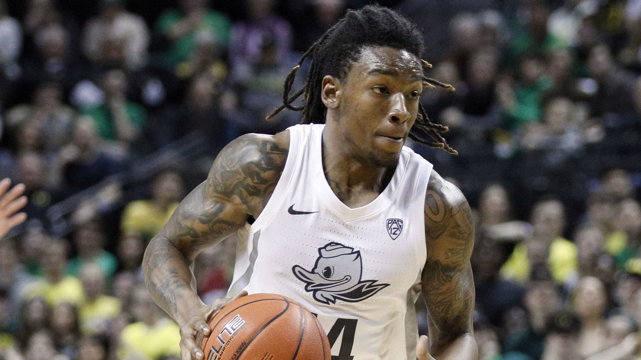 EUGENE, OR - FEBRUARY 27: Oregon Ducks forward C.J. Walker (14) dribbles the ball during the first half against the Oregon State Beavers on February 27, 2020 at Matthew Knight Arena in Eugene, OR.