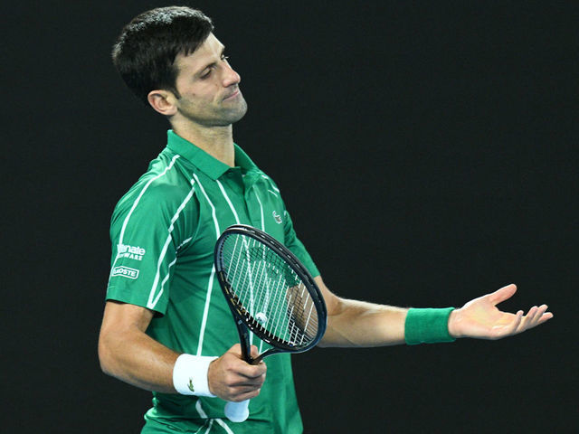 MELBOURNE, AUSTRALIA - (ARCHIVE) : A file photo dated February 2, 2020 shows Novak Djokovic of Serbia in action against Dominic Thiem (not seen) of Austria during Men's Singles Final match within the 2020 Australian Open at Melbourne Park in Melbourne, Australia. World no. 1 in menâs tennis, Serbiaâs Novak Djokovic, tests positive for coronavirus.