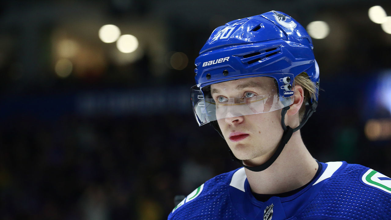 VANCOUVER, BC - MARCH 4: Elias Pettersson #40 of the Vancouver Canucks looks on from the bench during their NHL game against the Arizona Coyotes at Rogers Arena March 4, 2020 in Vancouver, British Columbia, Canada. "n