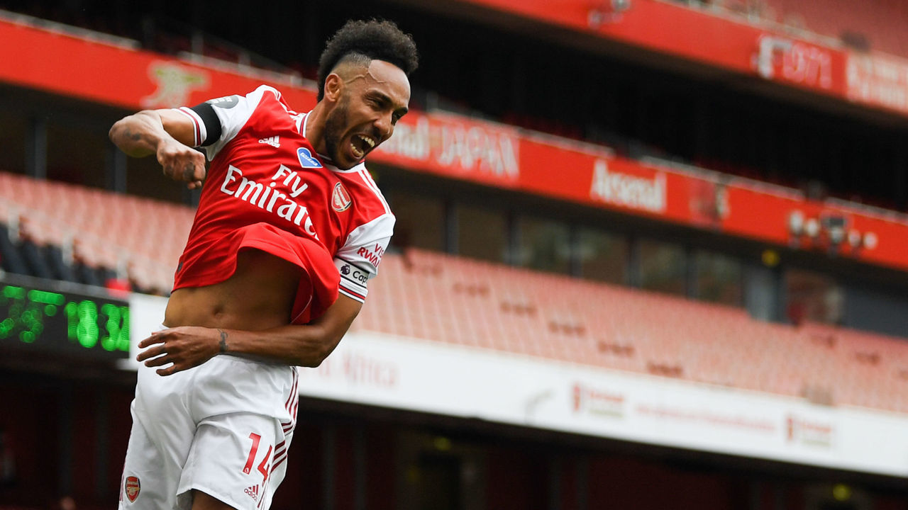 Arsenal's Gabonese striker Pierre-Emerick Aubameyang celebrates after scoring a goal during the English Premier League football match between Arsenal and Norwich City at the Emirates Stadium in London on July 1, 2020.
