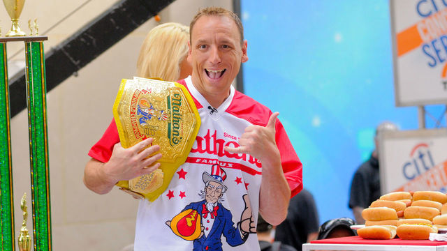 TODAY SHOW PLAZA, NEW YORK CITY, NY, UNITED STATES - 2019/07/05: Competitive Eater, Joey Chestnut seen during Country Music Star, Toby Keith's performance in New York City on NBC's Today Show.