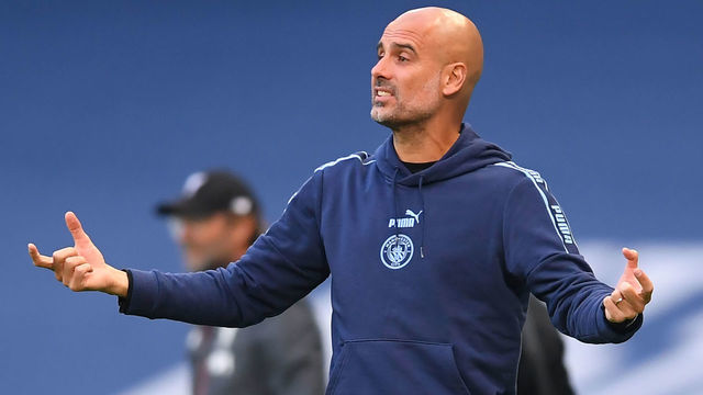 Manchester City's Spanish manager Pep Guardiola gestures on the touchline during the English Premier League football match between Manchester City and Liverpool at the Etihad Stadium in Manchester, north west England, on July 2, 2020.