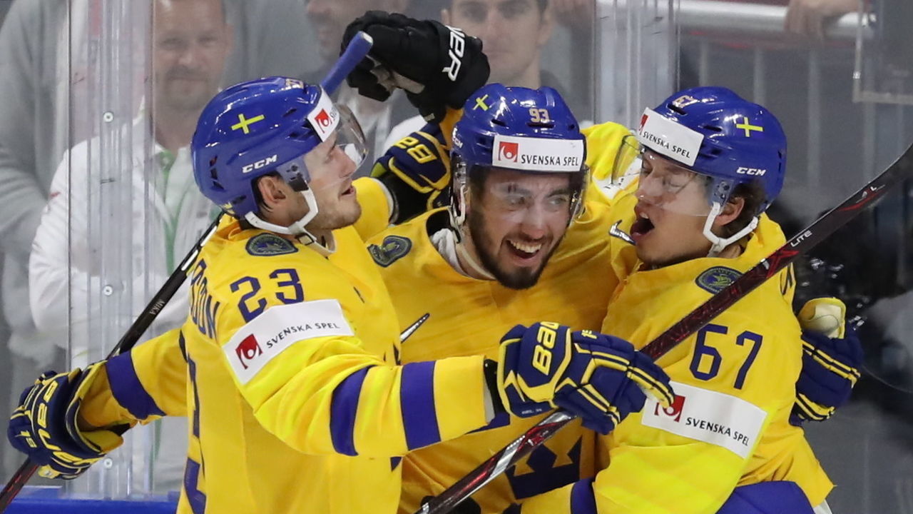 COPENHAGEN, DENMARK - MAY 15, 2018: Sweden's Oliver Ekman-Larsson, Mika Zibanejad, Rickard Rakell (L-R) celebrate scoring in the 2018 IIHF World Championship Preliminary Round Group A ice hockey match against Russia at Royal Arena. Anton Novoderezhkin/TASS