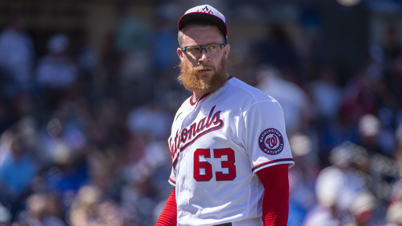 WEST PALM BEACH, FL - MARCH 12: Washington Nationals Pitcher Sean Doolittle (63) looks towards the bullpen as he walks back to the dugout after being relieved during an MLB spring training game between the New York Yankees and the Washington Nationals at The FITTEAM Ballpark of the Palm Beaches in West Palm Beach, Florida on March 12, 2020. pandemic.