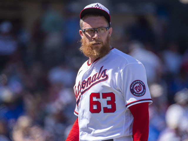 WEST PALM BEACH, FL - MARCH 12: Washington Nationals Pitcher Sean Doolittle (63) looks towards the bullpen as he walks back to the dugout after being relieved during an MLB spring training game between the New York Yankees and the Washington Nationals at The FITTEAM Ballpark of the Palm Beaches in West Palm Beach, Florida on March 12, 2020. pandemic.