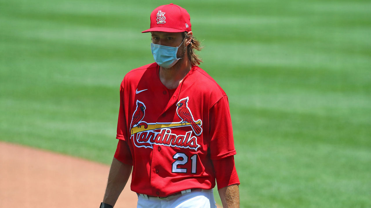 ST. LOUIS, MO - JULY 3: Andrew Miller #21 of the St. Louis Cardinals returns to the dugout during the first day of summer workouts at Busch Stadium on July 3, 2020 in St. Louis, Missouri.