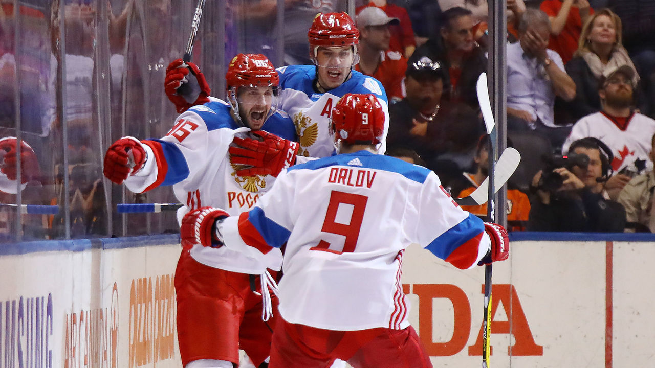 TORONTO, ON - SEPTEMBER 24: Nikita Kucherov #86 of Team Russia is congratulated by his teammates Dmitry Orlov #9 and Evgeni Malkin #71 after scoring a second period goal against Team Canada at the semifinal game during the World Cup of Hockey tournament at Air Canada Centre on September 24, 2016 in Toronto, Canada.