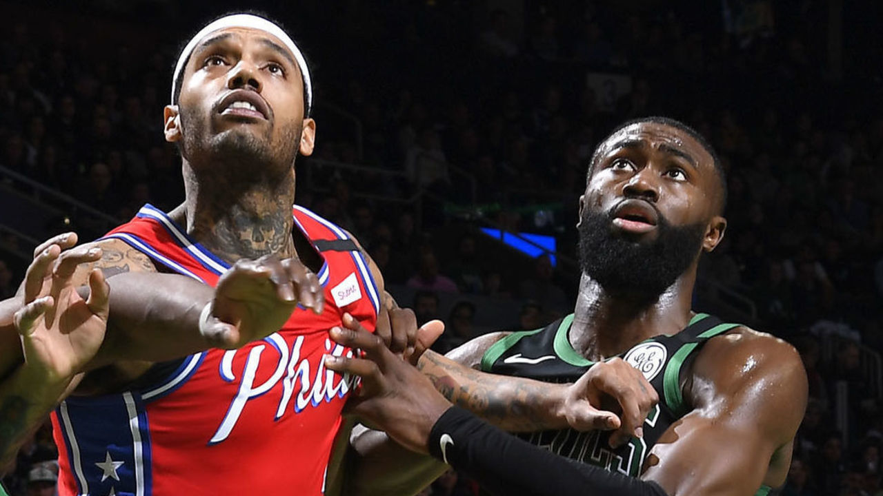 BOSTON, MA - FEBRUARY 1: Semi Ojeleye #37 of the Boston Celtics and Mike Scott #1 of the Philadelphia 76ers and Jaylen Brown #7 of the Boston Celtics fights for position to grab the rebound on February 1, 2020 at the TD Garden in Boston, Massachusetts. Mandatory Copyright Notice: Copyright 2020 NBAE