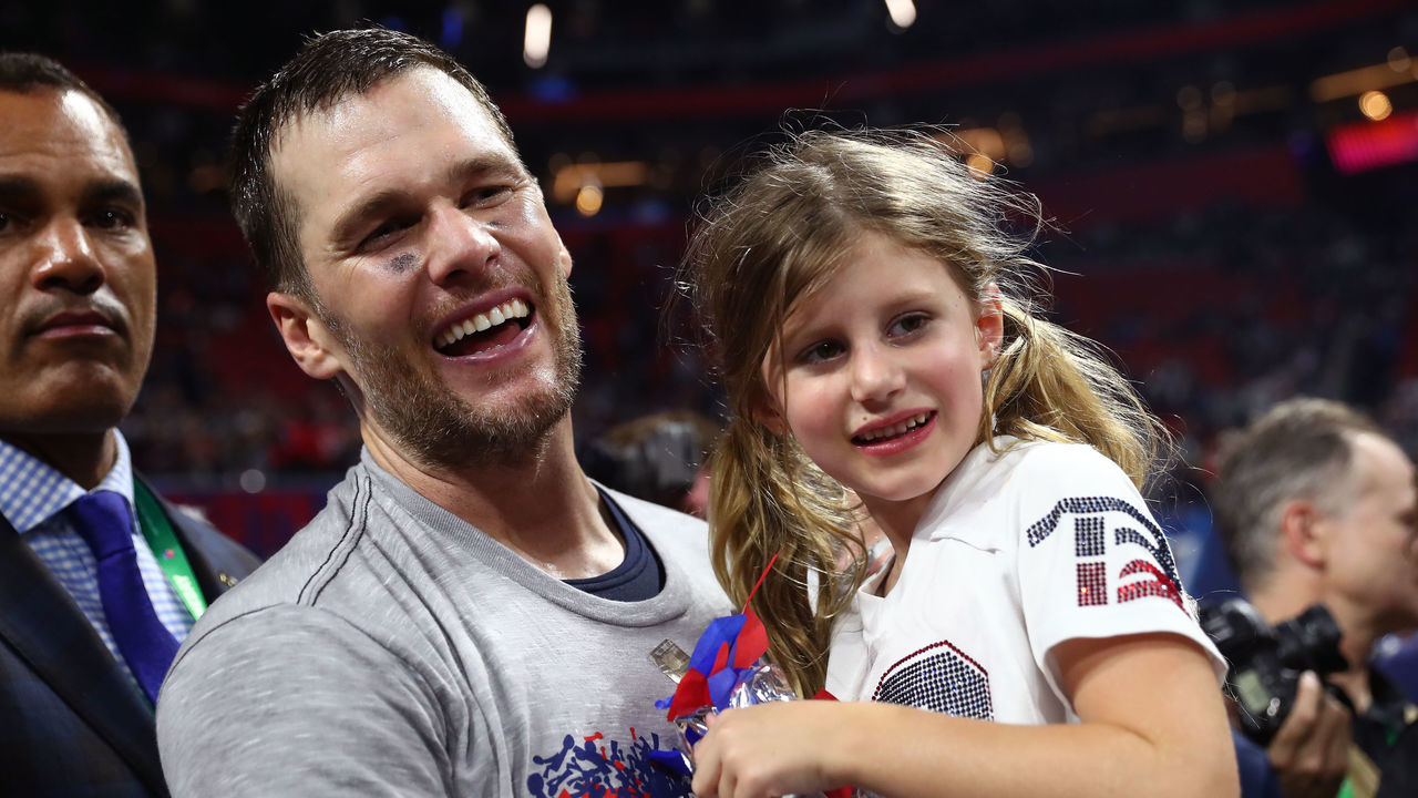 ATLANTA, GEORGIA - FEBRUARY 03: Tom Brady #12 of the New England Patriots celebrates with Vivian Lake Brady after his 13-3 win against Los Angeles Rams during Super Bowl LIII at Mercedes-Benz Stadium on February 03, 2019 in Atlanta, Georgia.