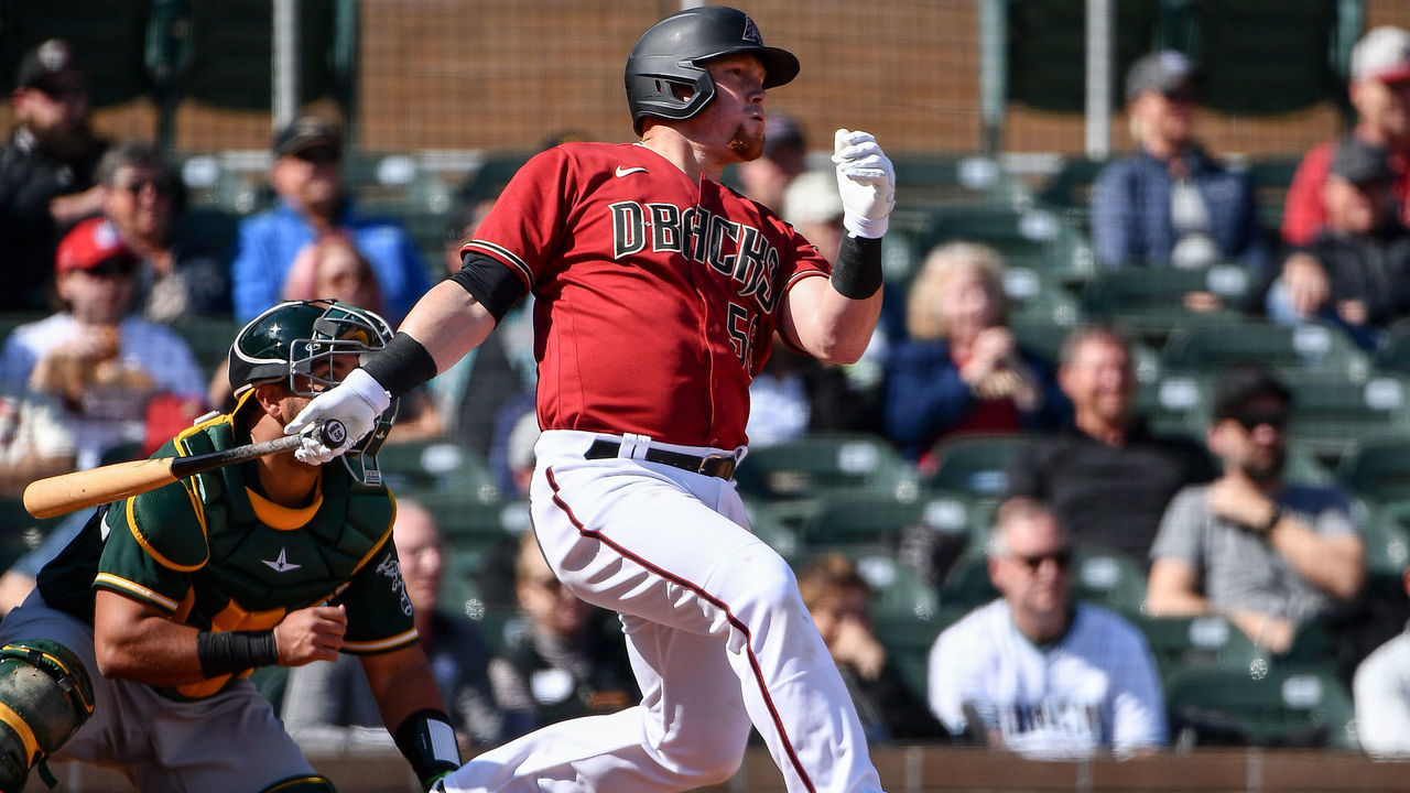 SCOTTSDALE, ARIZONA - FEBRUARY 23: Kole Calhoun #56 of the Arizona Diamondbacks swings at a pitch during the spring training game against the Oakland Athletics at Salt River Fields at Talking Stick on February 23, 2020 in Scottsdale, Arizona.