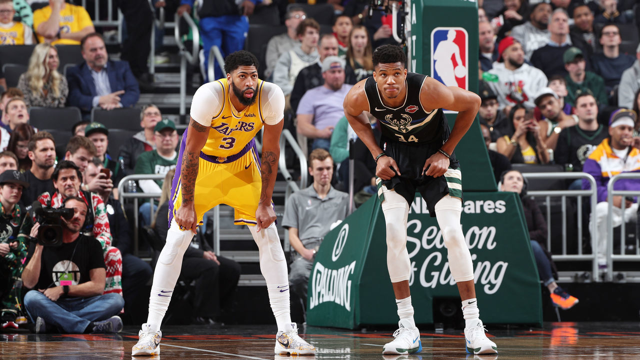MILWAUKEE, WI - DECEMBER 19: Anthony Davis #3 of the Los Angeles Lakers and Giannis Antetokounmpo #34 of the Milwaukee Bucks look on during a game on December 19, 2019 at the Fiserv Forum Center in Milwaukee, Wisconsin. Mandatory Copyright Notice: Copyright 2019 NBAE .