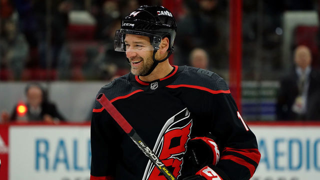 RALEIGH, NC - JANUARY 19: Justin Williams #14 of the Carolina Hurricanes reacts to a conversation of the ice during an NHL game against the New York Islanders on January 19, 2020 at PNC Arena in Raleigh, North Carolina.