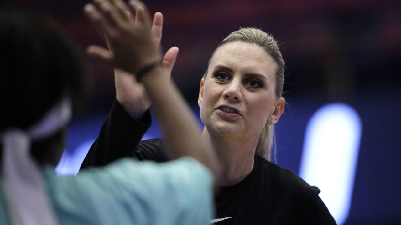 NEW YORK, NY - AUGUST 27: Assistant Coach Penny Taylor of the Phoenix Mercury hi-fives someone before the game against the New York Liberty on August 27, 2019 at the Westchester County Center in White Plains, New York. NOTE TO USER: User expressly acknowledges and agrees that, by downloading and/or using this photograph, user is consenting to the terms and conditions of the Getty Images License Agreement. Mandatory Copyright Notice: Copyright 2019 NBAE