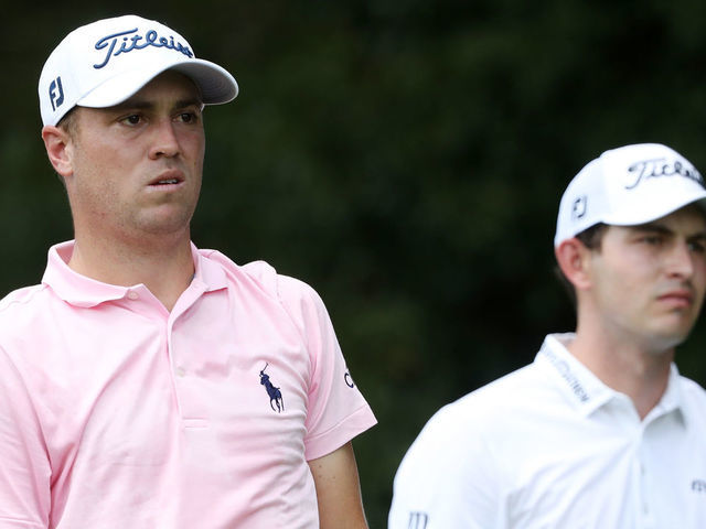 ATLANTA, GEORGIA - AUGUST 22: Justin Thomas of the United States and Patrick Cantlay of the United States look on from the second tee during the first round of the TOUR Championship at East Lake Golf Club on August 22, 2019 in Atlanta, Georgia.