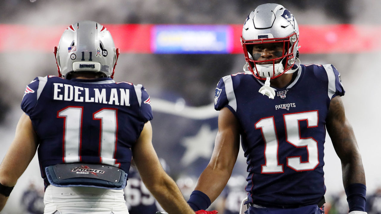 FOXBOROUGH, MA - NOVEMBER 24: New England Patriots wide receiver Julian Edelman (11) greets New England Patriots wide receiver NKeal Harry (15) before a game between the New England Patriots and the Dallas Cowboys on November 24, 2019, at Gillette Stadium in Foxborough, Massachusetts.