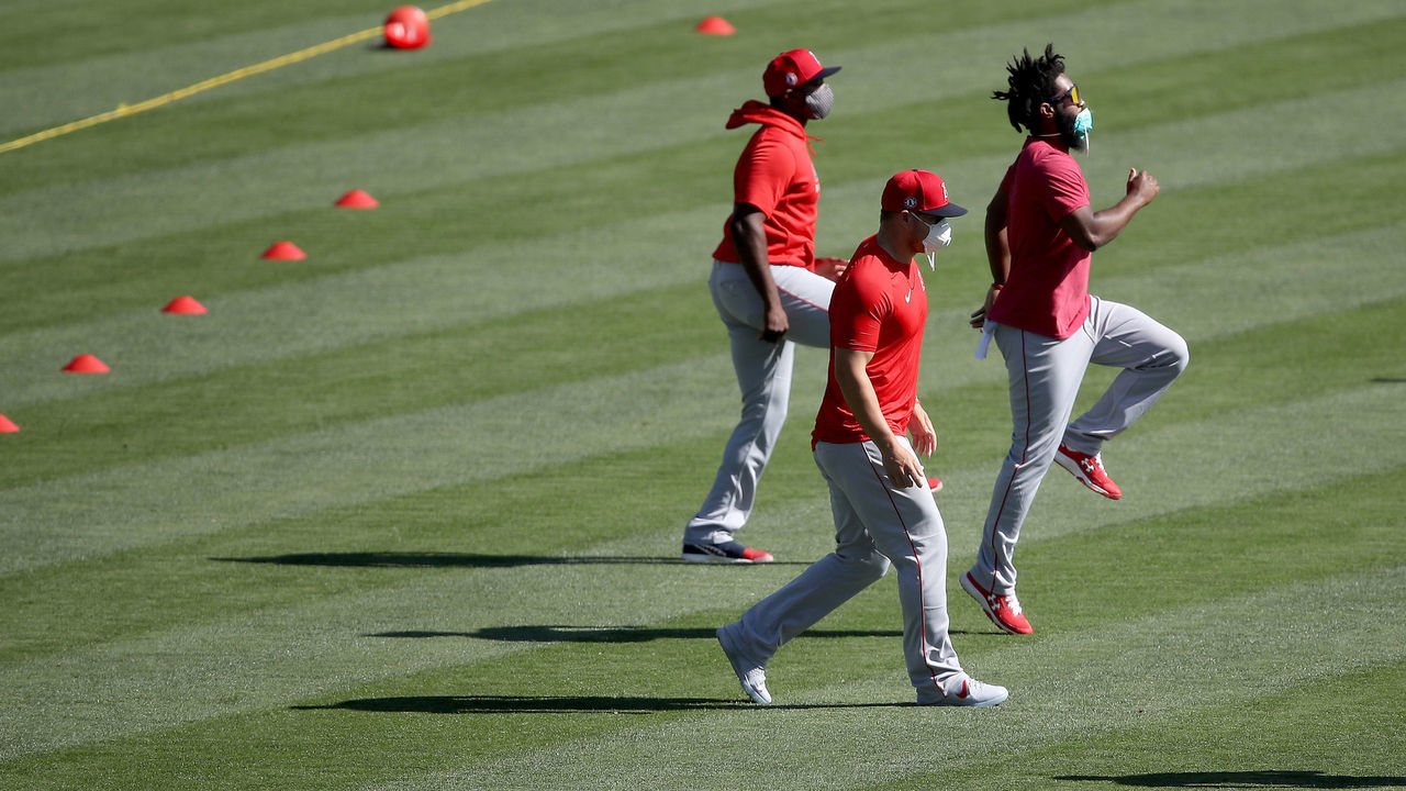 ANAHEIM, CALIFORNIA - JULY 03: (L-R) Justin Upton #10, Mike Trout #27 and Brian Goodwin #18 of the Los Angeles Angels practice during their summer workouts at Angel Stadium of Anaheim on July 03, 2020 in Anaheim, California.