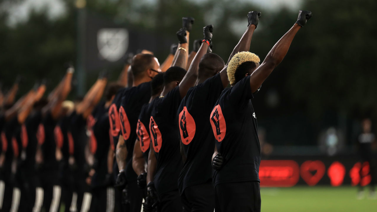 REUNION, FLORIDA - JULY 08: Players of MLS teams participate in a Black Lives Matter pre-game ceremony before match between Orlando City and Inter Miami as part of MLS is back Tournament at ESPN Wide World of Sports Complex on July 08, 2020 in Reunion, Florida.