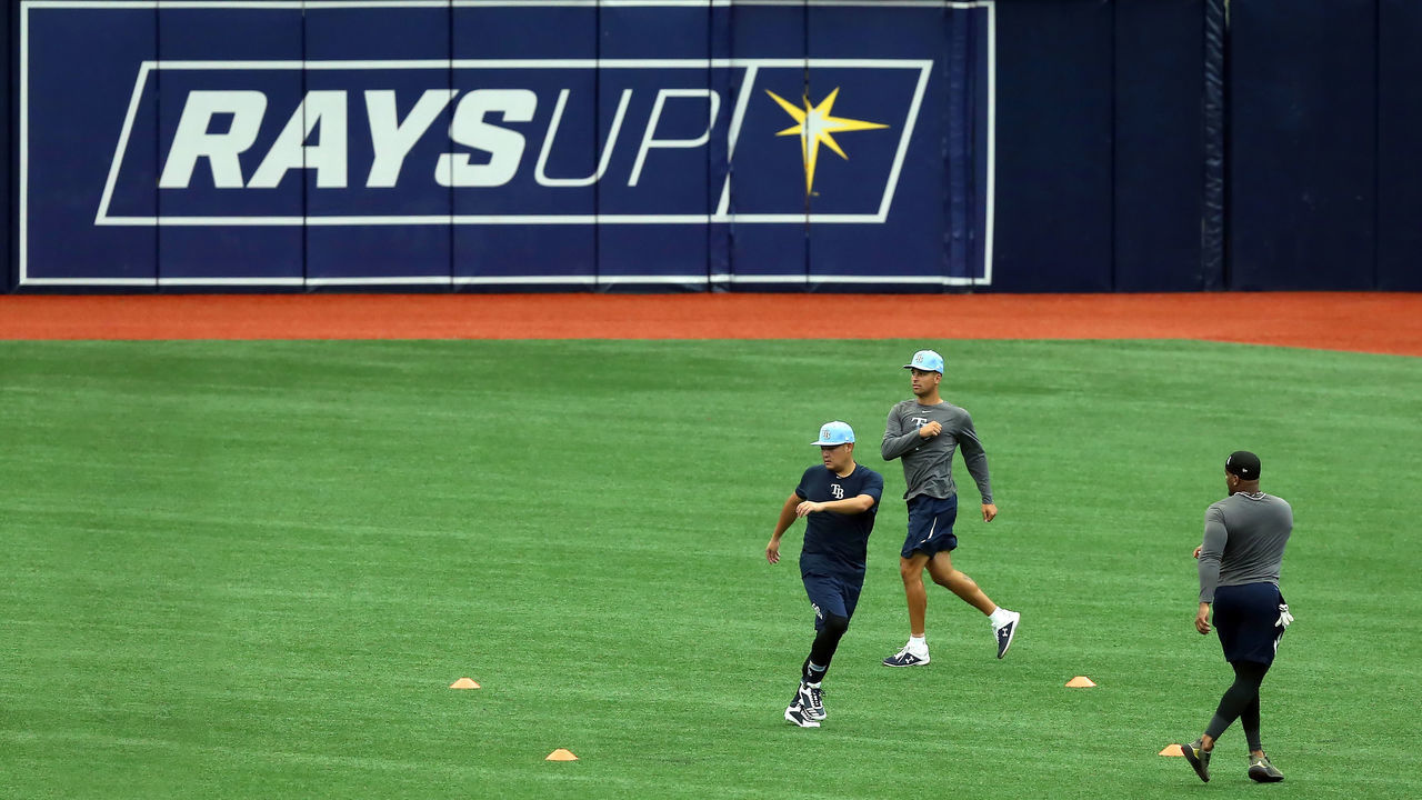 ST. PETERSBURG, FL - JULY 03: Yoshi Tsutsugo (25), Nate Lowe (35) and Yandy Diaz (2) go thru a drill together during the Tampa Bay Rays Summer Camp on July 03, 2020, at Tropicana Field in St. Petersburg, FL.