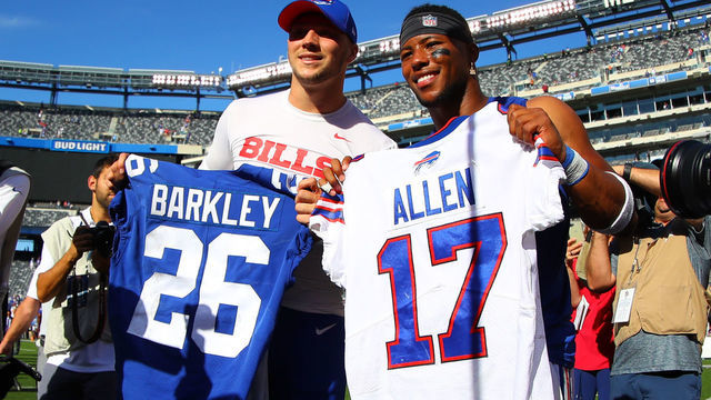 EAST RUTHERFORD, NJ - SEPTEMBER 15: Buffalo Bills quarterback Josh Allen (17) and New York Giants running back Saquon Barkley (26) exchange jerseys after the National Football League game between the New York Giants and Buffalo Bills on September 15, 2019 at MetLife Stadium in East Rutherford, NJ.
