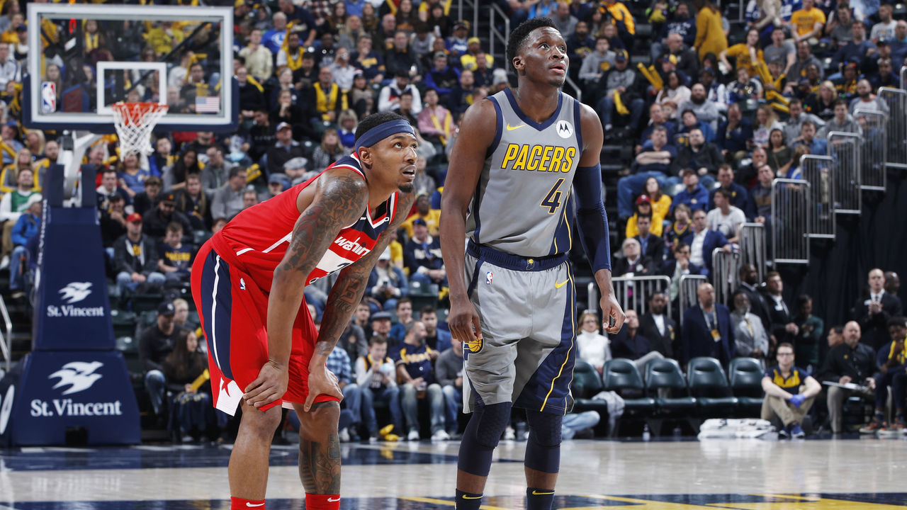 INDIANAPOLIS, IN - DECEMBER 23: Bradley Beal #3 of the Washington Wizards looks on alongside Victor Oladipo #4 of the Indiana Pacers during the game at Bankers Life Fieldhouse on December 23, 2018 in Indianapolis, Indiana. The Pacers won 105-89. NOTE TO USER: User expressly acknowledges and agrees that, by downloading and or using the photograph, User is consenting to the terms and conditions of the Getty Images License Agreement.