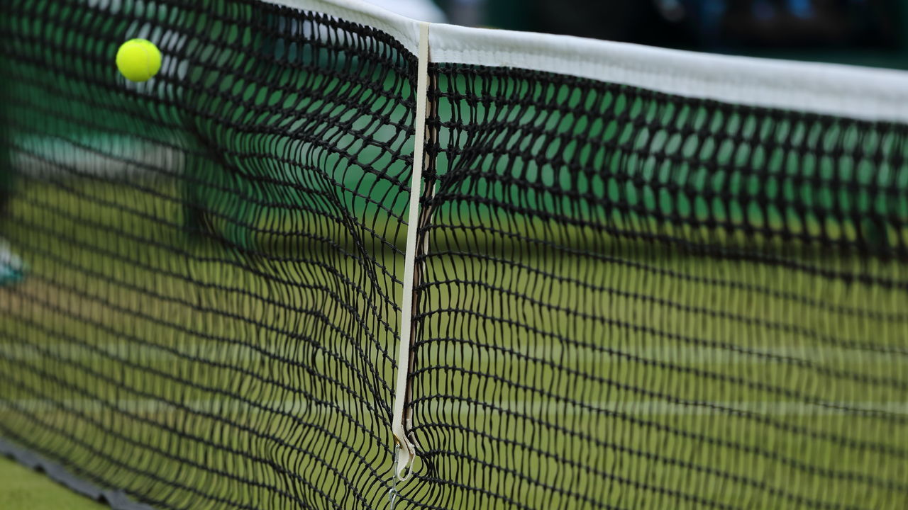 NOTTINGHAM, ENGLAND - JUNE 16: A general shot of a tennis ball hitting the net during Day Eight of the Nature Valley open at Nottingham Tennis Centre on June 16, 2018 in Nottingham, England.