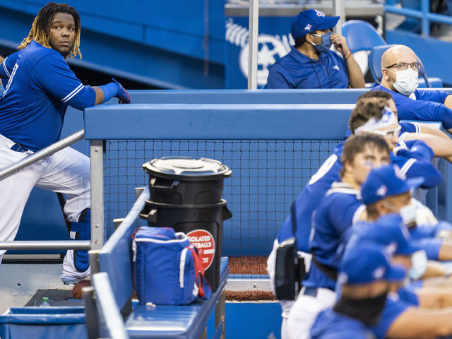 TORONTO, ON - JULY 09: Vladimir Guerrero Jr. #27 of the Toronto Blue Jays looks on in the dugout during an intrasquad game at Rogers Centre on July 9, 2020 in Toronto, Canada.