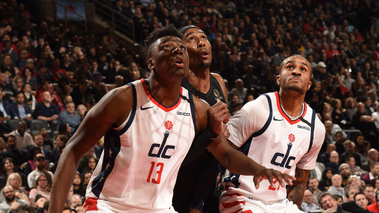 TORONTO, CANADA - JANUARY 17: Thomas Bryant #13 and Gary Payton II #20 of the Washington Wizards play defense against the Toronto Raptors on January 17, 2020 at the Scotiabank Arena in Toronto, Ontario, Canada. Mandatory Copyright Notice: Copyright 2020 NBAE