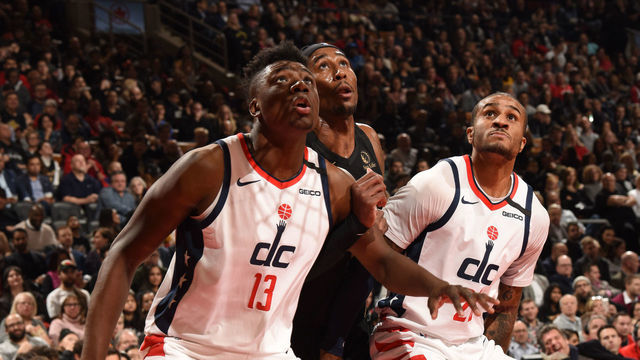 TORONTO, CANADA - JANUARY 17: Thomas Bryant #13 and Gary Payton II #20 of the Washington Wizards play defense against the Toronto Raptors on January 17, 2020 at the Scotiabank Arena in Toronto, Ontario, Canada. Mandatory Copyright Notice: Copyright 2020 NBAE