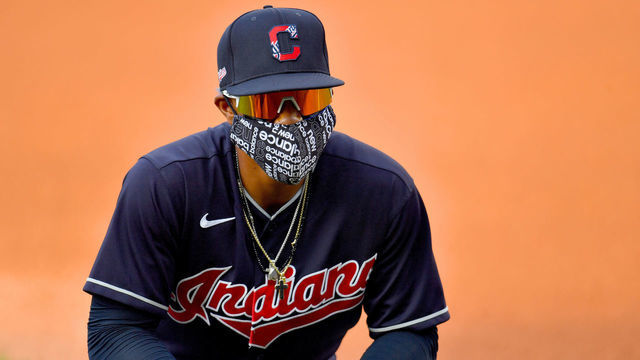 CLEVELAND, OHIO - JULY 09: Francisco Lindor #12 of the Cleveland Indians warms up on the field wearing a face mask prior to an intrasquad game during summer workouts at Progressive Field on July 09, 2020 in Cleveland, Ohio.