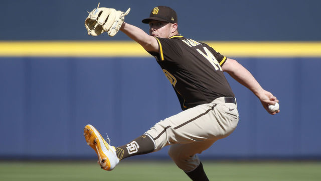 PEORIA, ARIZONA - MARCH 05: Pitcher Emilio Pagan #14 of the San Diego Padres throws against the Seattle Mariners during a Cactus League spring training baseball game at Peoria Stadium on March 05, 2020 in Peoria, Arizona.
