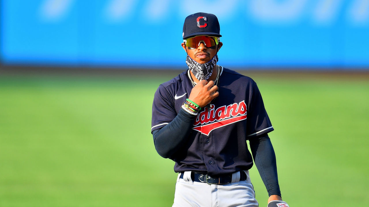 CLEVELAND, OHIO - JULY 09: Francisco Lindor #12 of the Cleveland Indians warms up on the field wearing a face mask prior to an intrasquad game during summer workouts at Progressive Field on July 09, 2020 in Cleveland, Ohio.