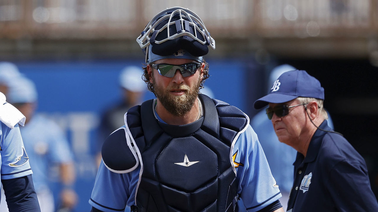 PORT CHARLOTTE, FL - FEBRUARY 26: Blake Snell #4 and Kevan Smith #44 of the Tampa Bay Rays walk to the dugout after warming up before a Grapefruit League spring training game against the Minnesota Twins at Charlotte Sports Park on February 26, 2020 in Port Charlotte, Florida.