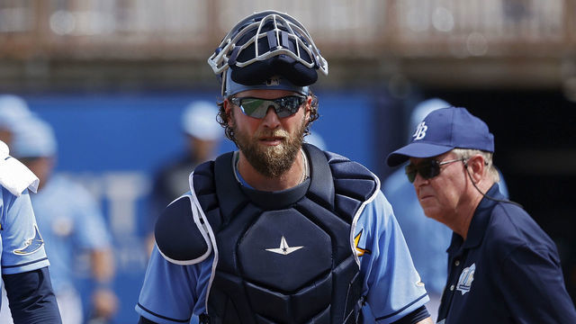 PORT CHARLOTTE, FL - FEBRUARY 26: Blake Snell #4 and Kevan Smith #44 of the Tampa Bay Rays walk to the dugout after warming up before a Grapefruit League spring training game against the Minnesota Twins at Charlotte Sports Park on February 26, 2020 in Port Charlotte, Florida.