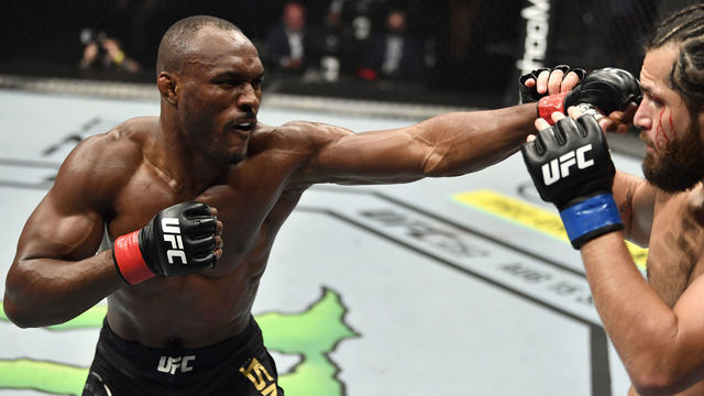 ABU DHABI, UNITED ARAB EMIRATES - JULY 12: (L-R) Kamaru Usman of Nigeria punches Jorge Masvidal in their UFC welterweight championship fight during the UFC 251 event at Flash Forum on UFC Fight Island on July 12, 2020 on Yas Island, Abu Dhabi, United Arab Emirates.