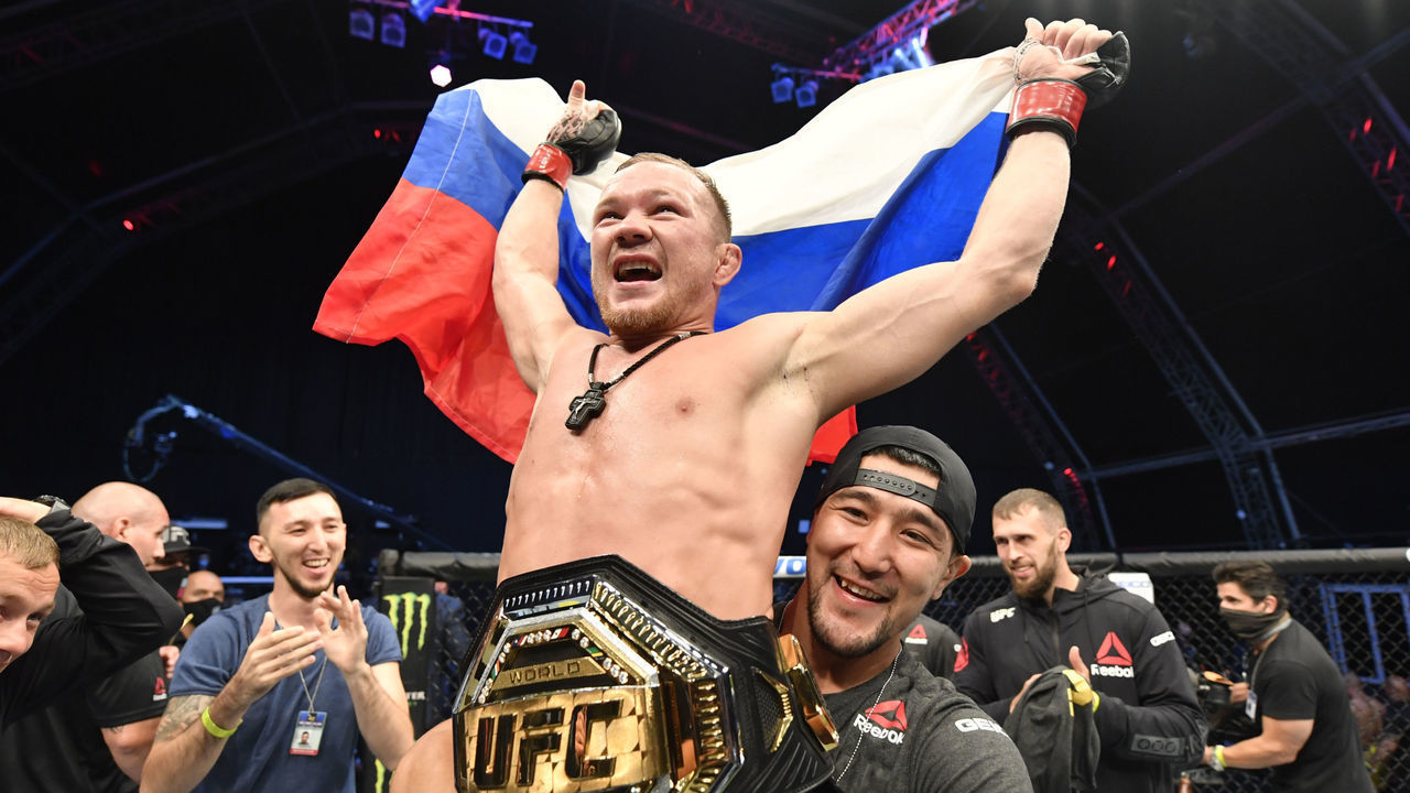 ABU DHABI, UNITED ARAB EMIRATES - JULY 12: Petr Yan of Russia celebrates after his TKO victory over Jose Aldo in their UFC bantamweight championship fight during the UFC 251 event at Flash Forum on UFC Fight Island on July 12, 2020 on Yas Island, Abu Dhabi, United Arab Emirates.