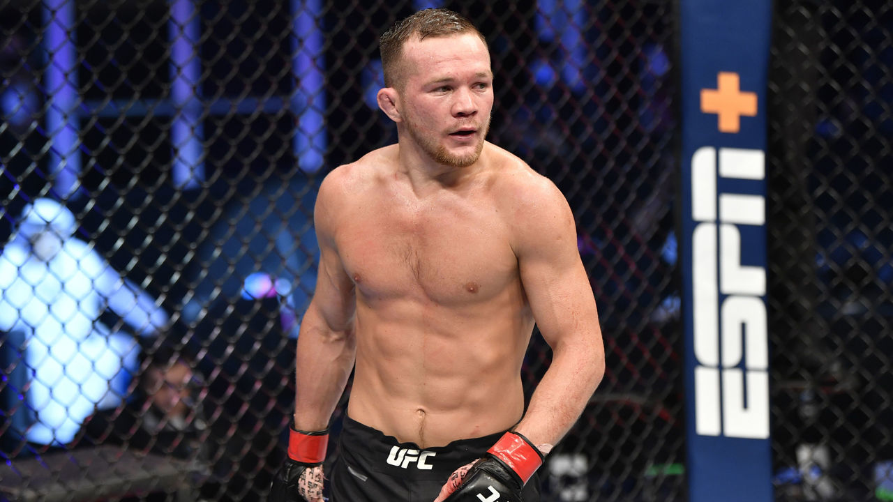 ABU DHABI, UNITED ARAB EMIRATES - JULY 12: Petr Yan of Russia celebrates after his TKO victory over Jose Aldo in their UFC bantamweight championship fight during the UFC 251 event at Flash Forum on UFC Fight Island on July 12, 2020 on Yas Island, Abu Dhabi, United Arab Emirates.