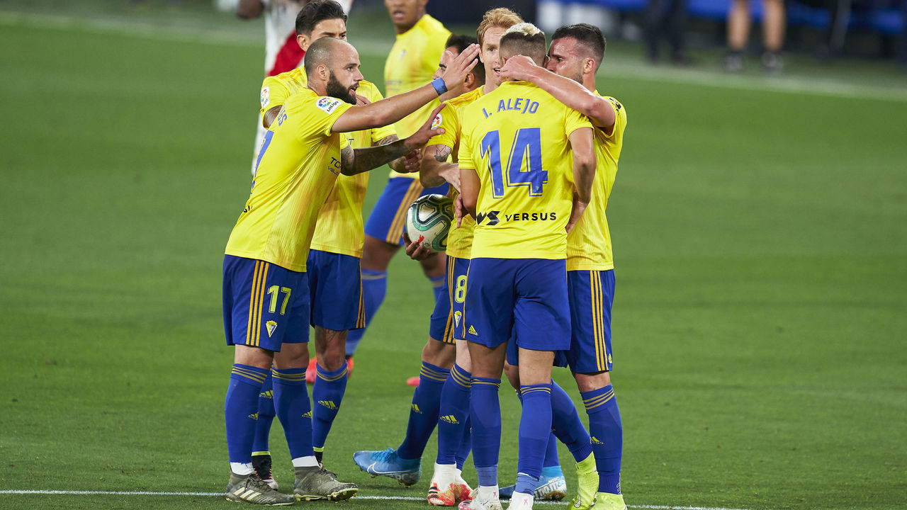 CADIZ, SPAIN - JUNE 14: Alvaro Gimenez of Cadiz CF celebrates after scoring his team's first goal with his teammates during La Liga SmartBank match between Cadiz CF and Rayo Vallecano at Estadio Ramon de Carranza on June 14, 2020 in Cadiz, Spain.