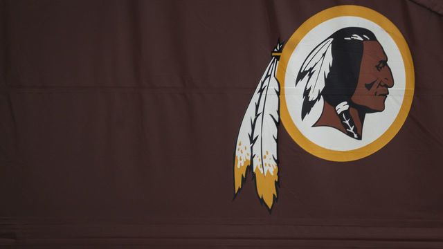 LANDOVER, MD - JULY 07: A Washington Redskins logo is seen on the outside of FedEx Field on July 7, 2020 in Landover, Maryland. After receiving recent pressure from sponsors and retailers, the NFL franchise is considering a name change to replace Redskins. The term "redskin" is a dictionary-defined racial slur for Native Americans.