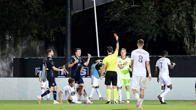 REUNION, FLORIDA - JULY 12: A red card is issued to Tim Melia #29 of Sporting Kansas City in the second half of their game during a match against Minnesota United in the MLS Is Back Tournament at ESPN Wide World of Sports Complex on July 12, 2020 in Reunion, Florida.