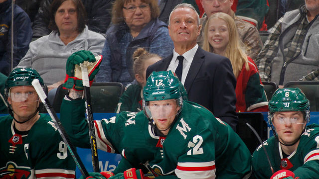 ST PAUL, MINNESOTA - FEBRUARY 15: Interim head coach Dean Evason, Mikko Koivu #9 Eric Staal #12 and Ryan Donato #6 of the Minnesota Wild watch play against the San Jose Sharks from the bench during the first period of the game on February 15, 2020 in St Paul, Minnesota.