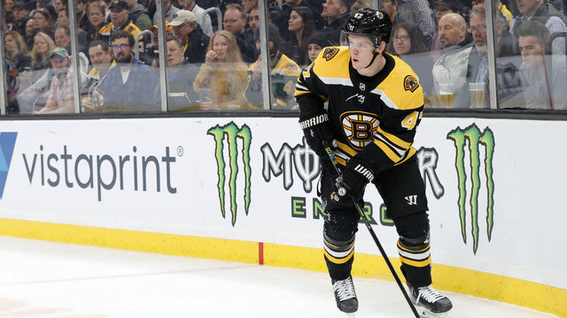 BOSTON, MA - MARCH 07: Boston Bruins left defenseman Torey Krug (47) holds the puck in the corner on the power play during a game between the Boston Bruins and the Tampa Bay Lightning on March 7, 2020 at TD Garden in Boston, Massachusetts.