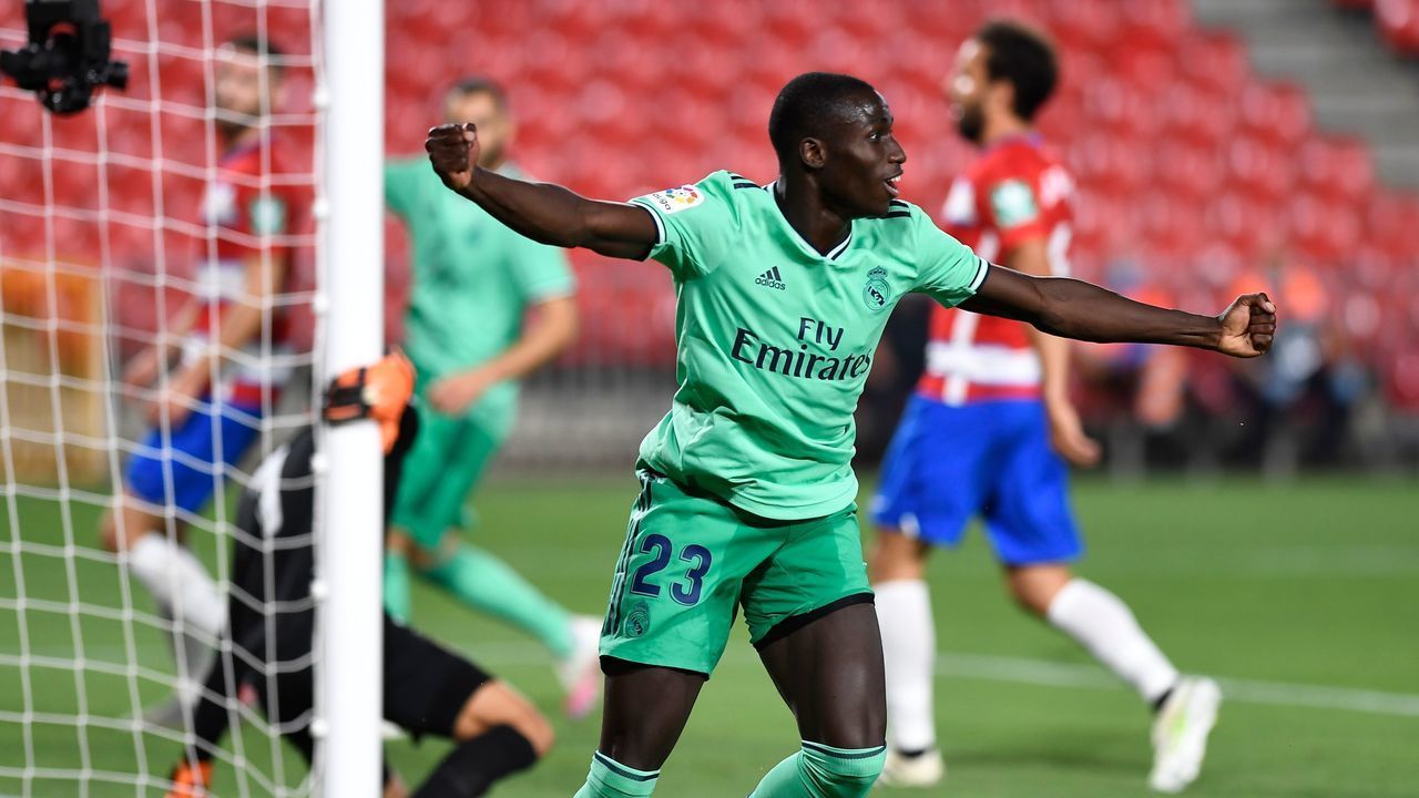 Real Madrid's French defender Ferland Mendy celebrates after scoring during the Spanish league football match Granada FC vs Real Madrid CF at Nuevo Los Carmenes stadium in Granada on July 13, 2020.