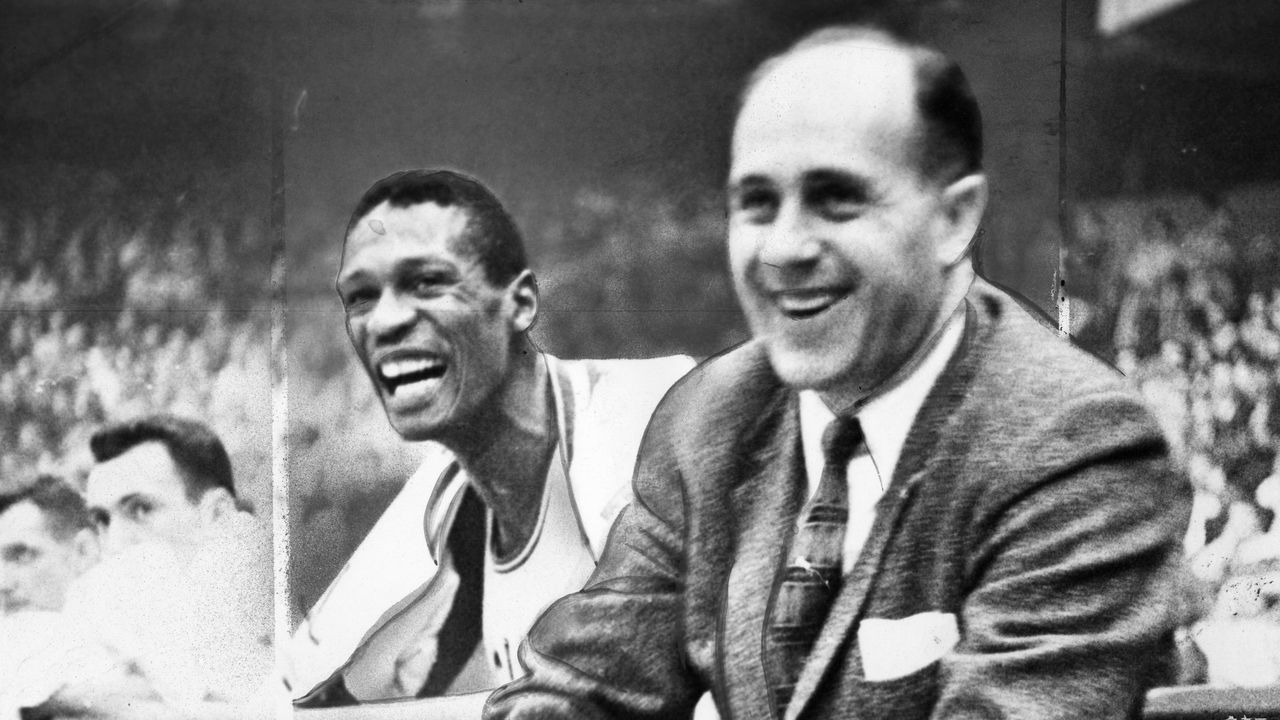 BOSTON - DECEMBER 26: Boston Celtics player Bill Russell and coach Red Auerbach during a game against the Philadelphia Warriors at Boston Garden on Dec. 26, 1956.
